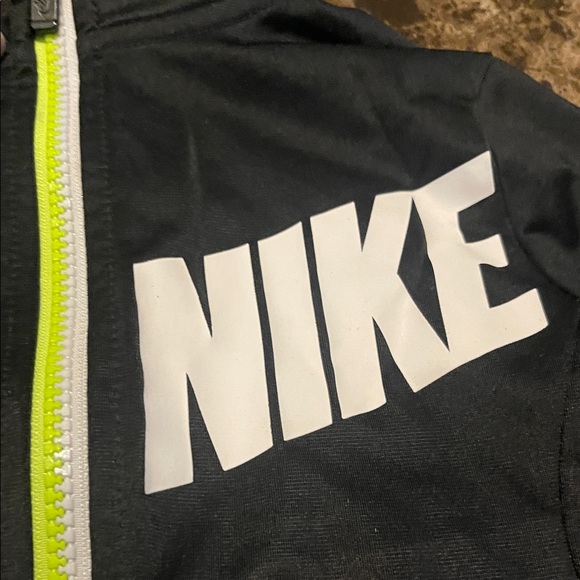 Nike Black Jacket with White Logo and Yellow Zipper - Picture 4 of 8